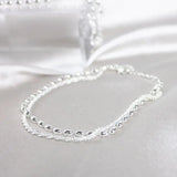 Amparo - Conjunto de Pulseiras Prateadas Elegantes com Pedras de Zircónio