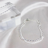 Amparo - Conjunto de Pulseiras Prateadas Elegantes com Pedras de Zircónio