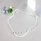Amparo - Conjunto de Pulseiras Prateadas Elegantes com Pedras de Zircónio