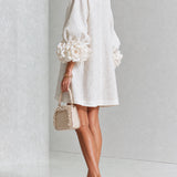 Vestido Mini Floral com Botões e Punhos Florais Marcantes
